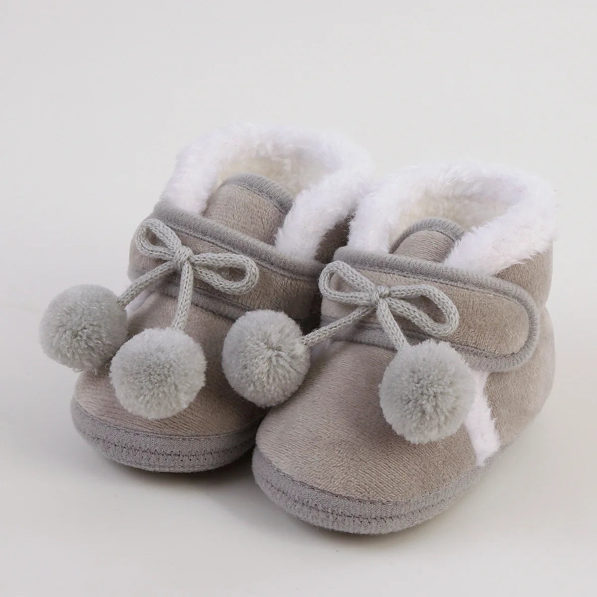 Adorable Pompom Baby Booties for Winter Comfort